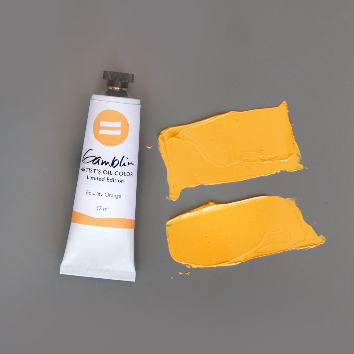 Gamblin Equality Orange Oil Paint limited edition color tube with color streaks